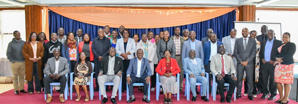 Participants of the Risk Management Workshop, take a group photo with management led by the Vice-Chancellor, Eng. Prof Ayub Gitau and the DVC, Finance Planning and Development, Prof Josiah Aduda during the Risk Management Workshop.