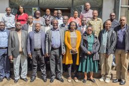 Deputy Vice-Chancellor for Finance, Planning and Development, Prof. Josiah Aduda, poses for a group photo with members of staff from the ICT Department following a courtesy call and engagement session