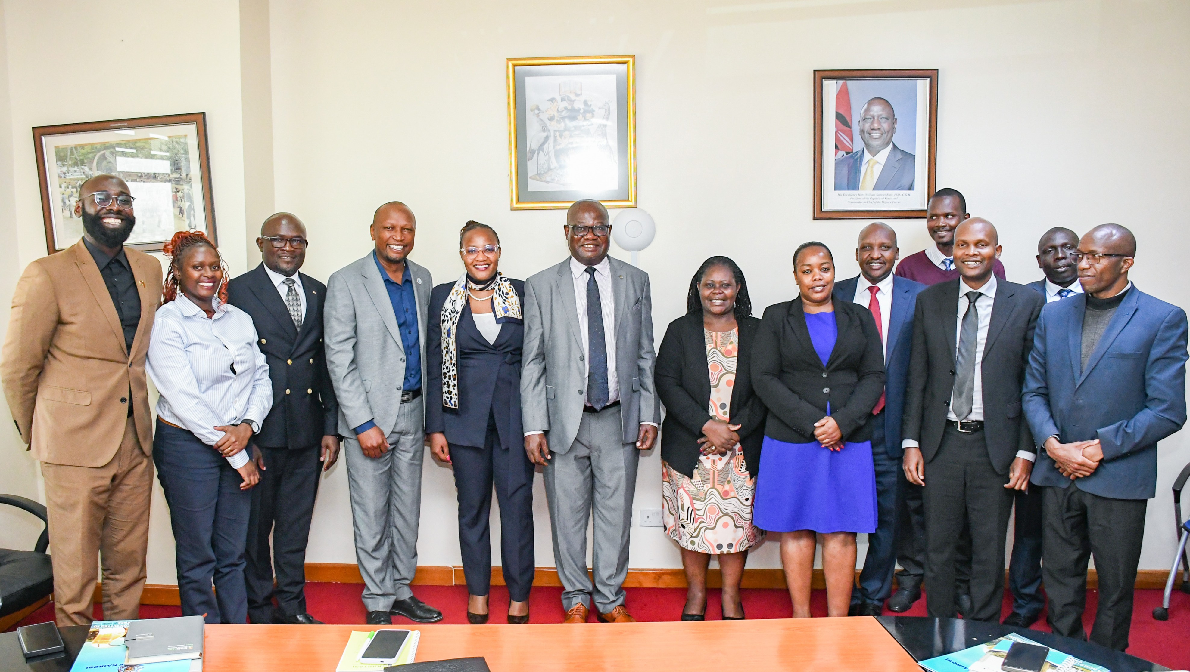 DVC FPD, Prof. Josiah Aduda, with members of the Britam Holdings delegation during a courtesy call