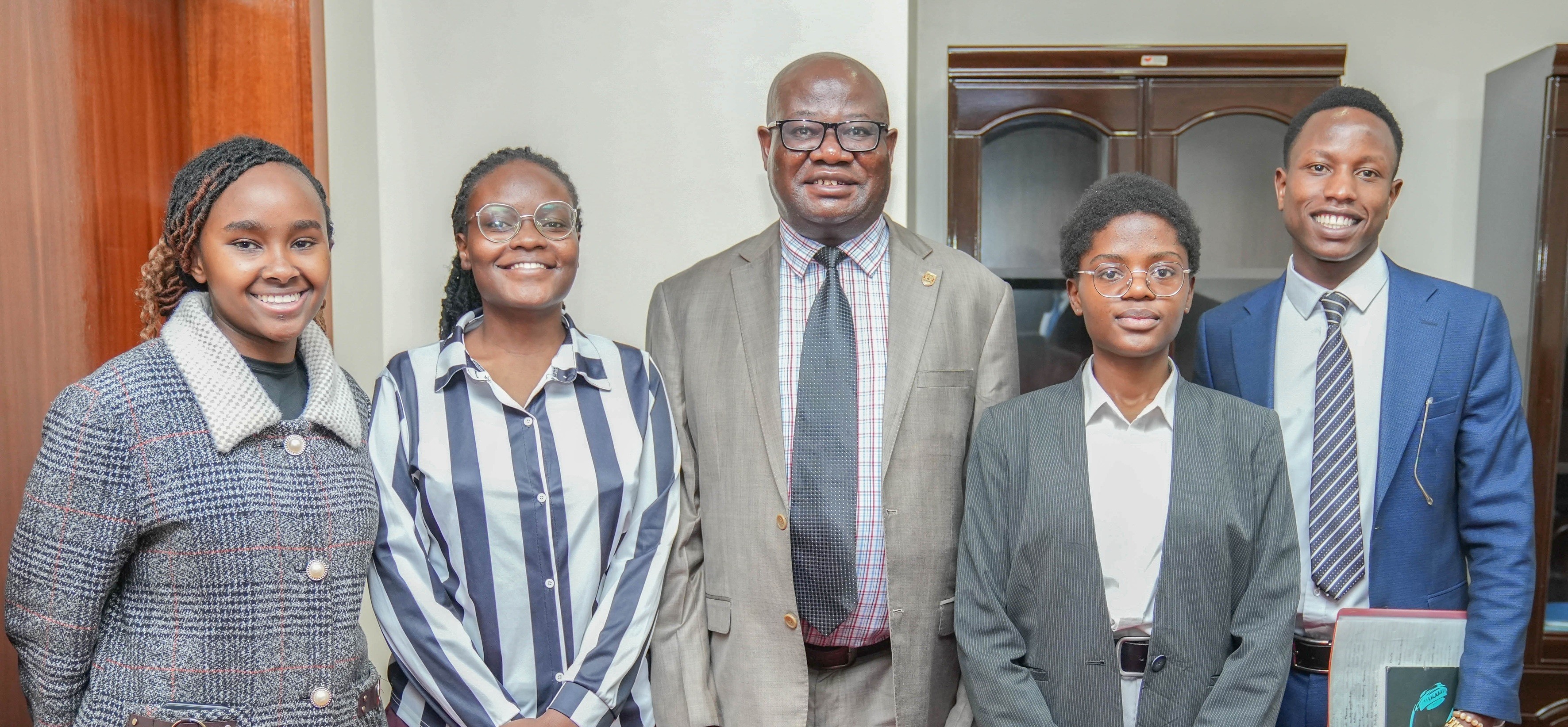 Prof Josiah Aduda with student leaders who had paid a courtesy call to him
