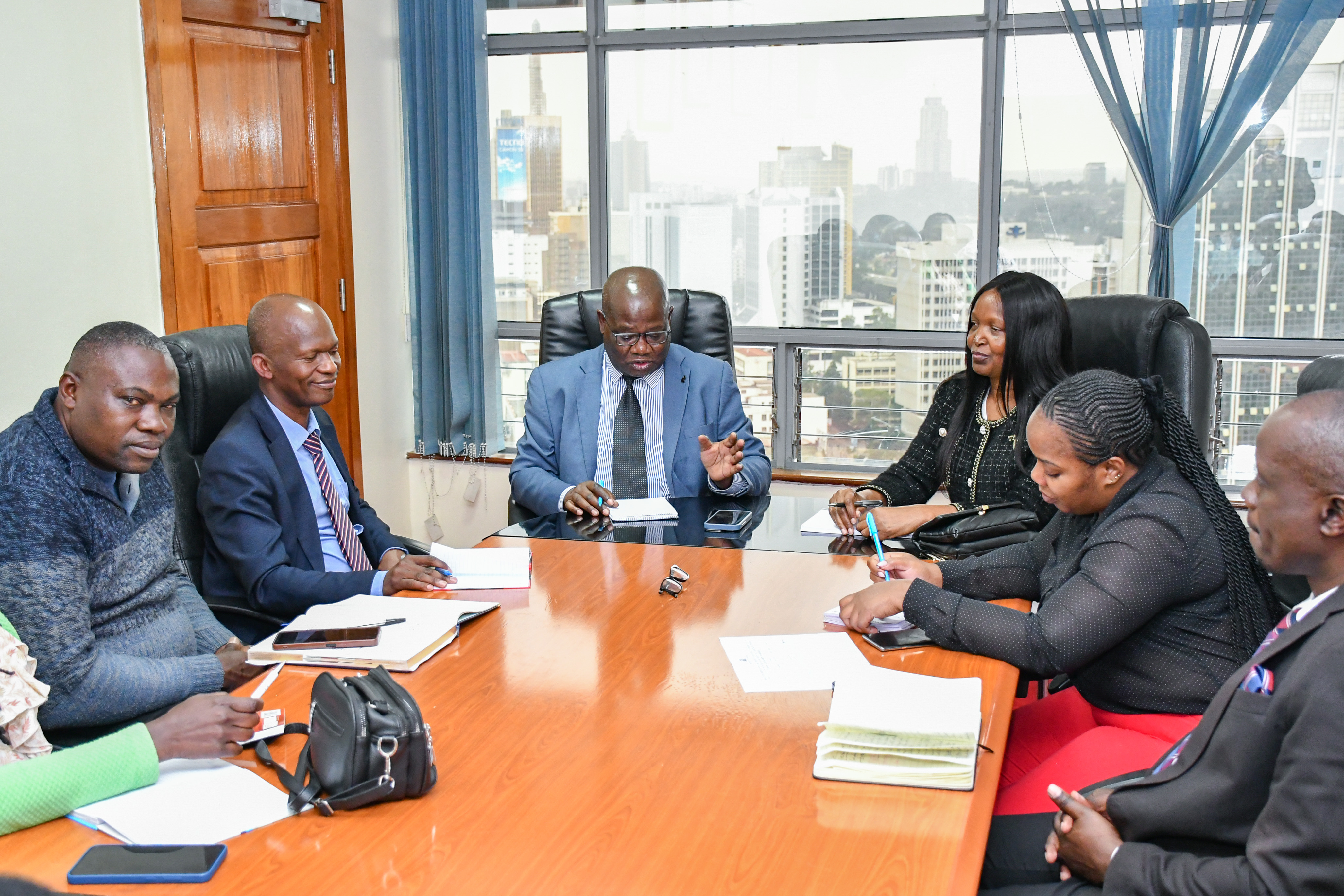 Officials of the University Academic Staff Union (UASU) – Nairobi University Chapter engage in discussions