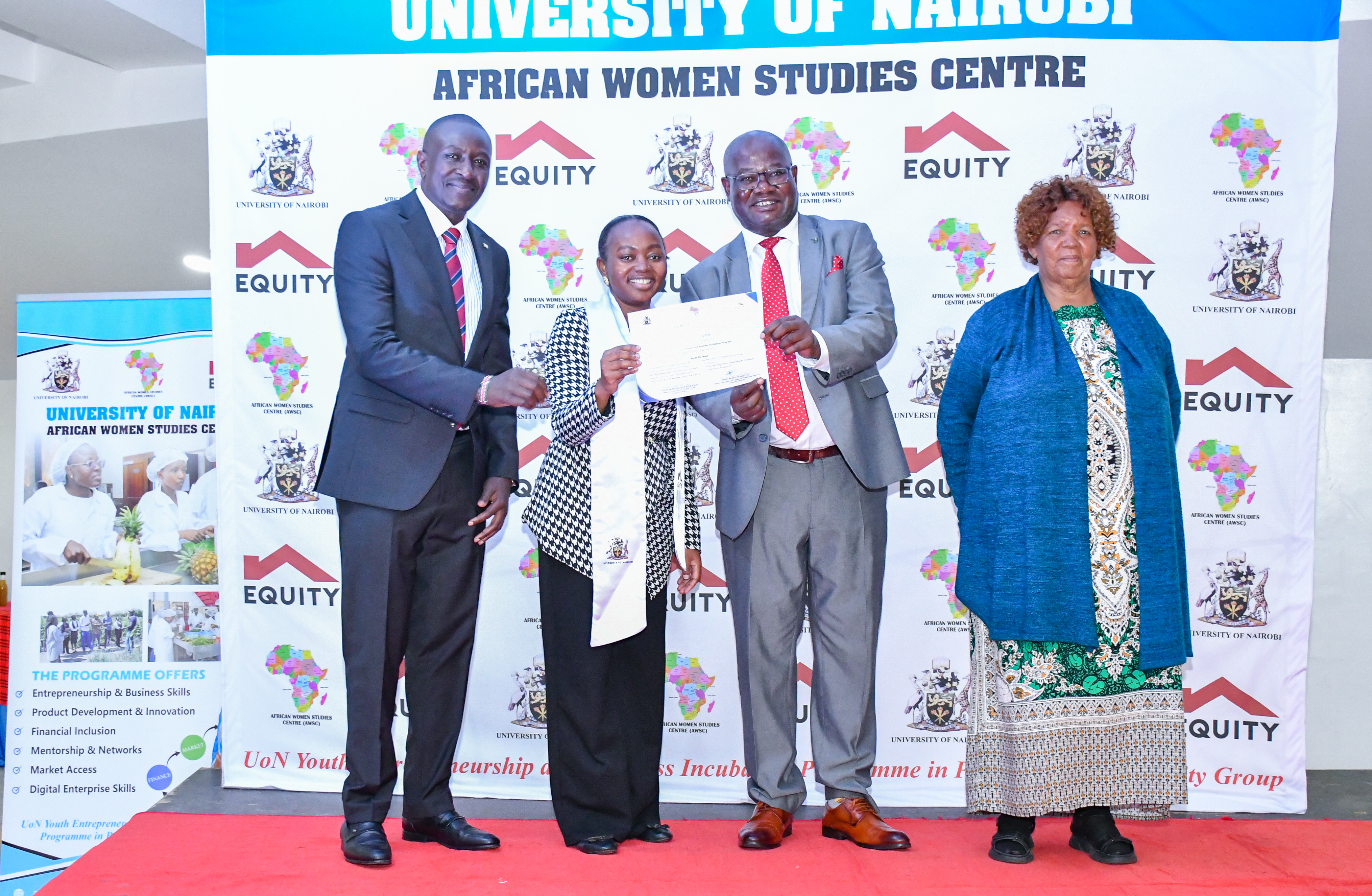 The DVC FPD awards certificate to one trainee of the UoN Youth Entrepreneurship Incubation Hub