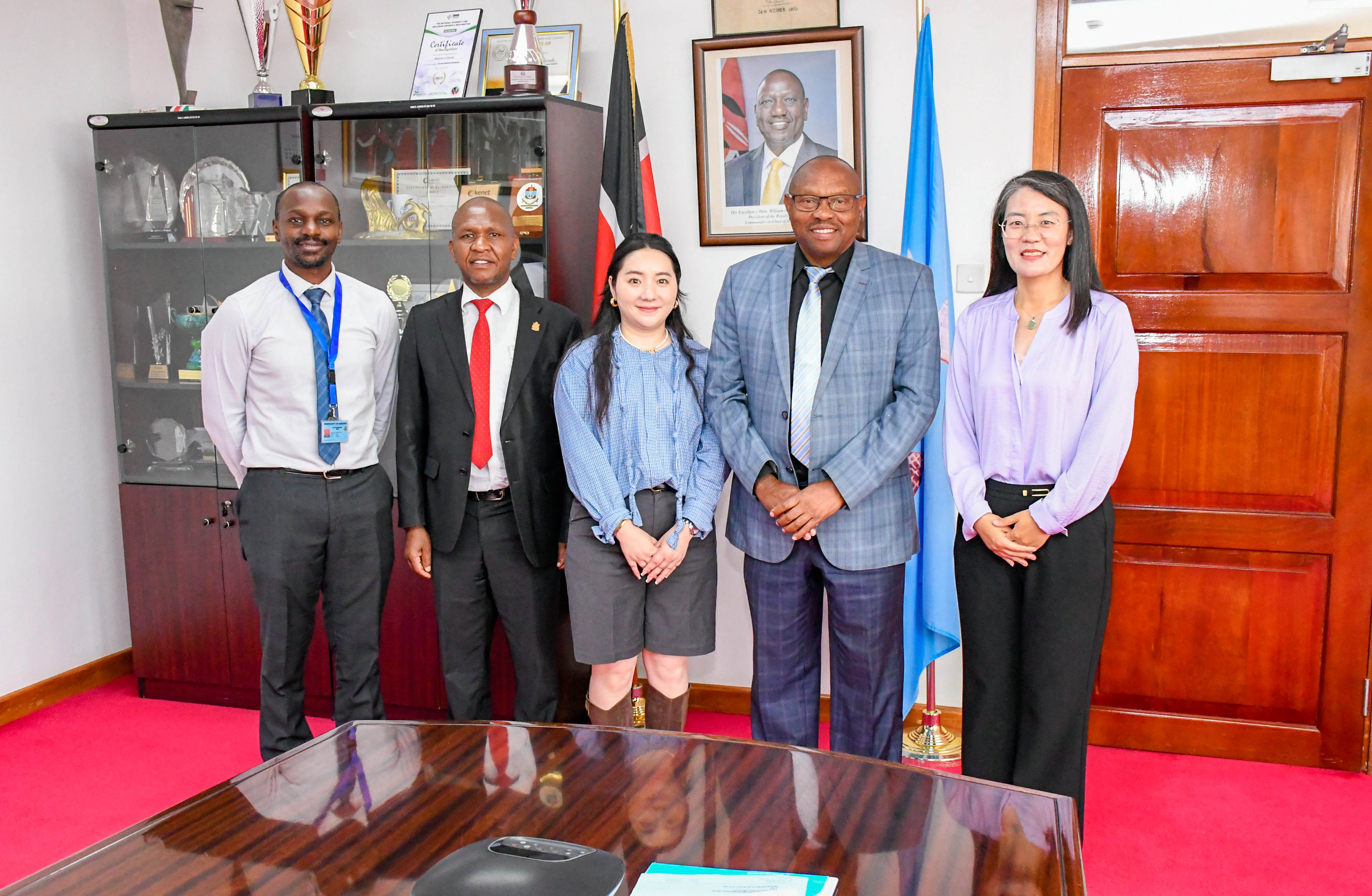 Cheque presentation ceremony by Chinese Property Developer Association (Kenya) group photo