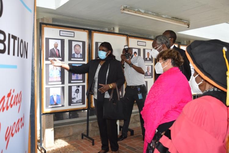 The Management goes through the Photo exhibition of the history of UoN