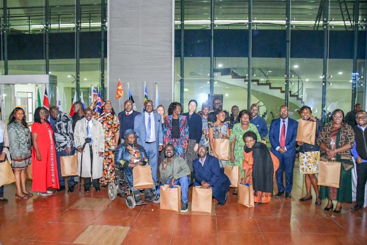 Participants from the University of Nairobi, pose for a group photo during the closing ceremony of the GETM4 International Sandpit at the University of Nairobi