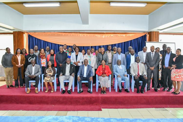 Participants of the Risk Management Workshop, take a group photo with management led by the Vice-Chancellor, Eng. Prof Ayub Gitau and the DVC, Finance Planning and Development, Prof Josiah Aduda during the Risk Management Workshop.