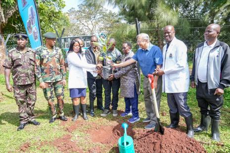 University management and partners participate in the annual tree planting exercise.