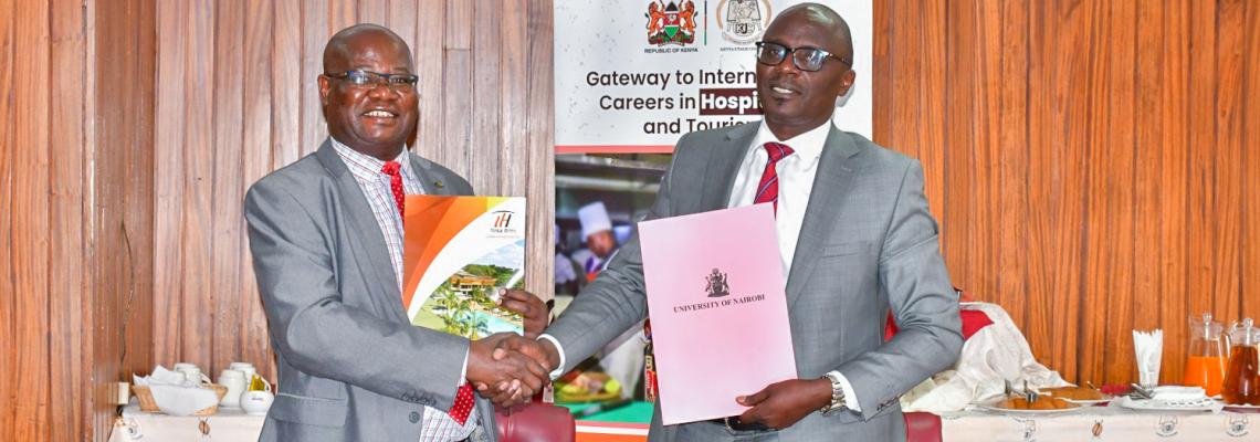 The DVC, Prof Josiah Aduda and Kenya Utalii College Principal/CEO Mr. Mark Ogendi exchange the signed MoU following the official signing ceremony.