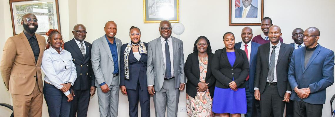 DVC FPD, Prof. Josiah Aduda, with members of the Britam Holdings delegation during a courtesy call